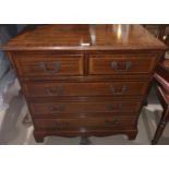 A modern mahogany reproduction dwarf chest of 3 long and 2 short drawers