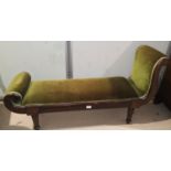 A 19th century mahogany Regency style window seat with scroll end, upholstered in green