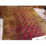 An Afghan carpet, 397 x 275cm approx