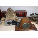 A brass desk organiser with letter rack and inkwell; an oak cased clock by Finnigan's of Manchester