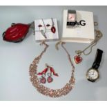 A selection of costume jewellery; a diamante 3 tier necklace, boxed; a Dolce & Gabbana chrome and