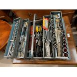 A tool box containing engineers tools