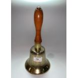 An ARP bell with turned wood handle