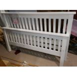 A 4'6" rail end bed in white