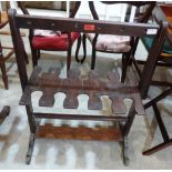 A 19th century mahogany boot rack. (Worm)