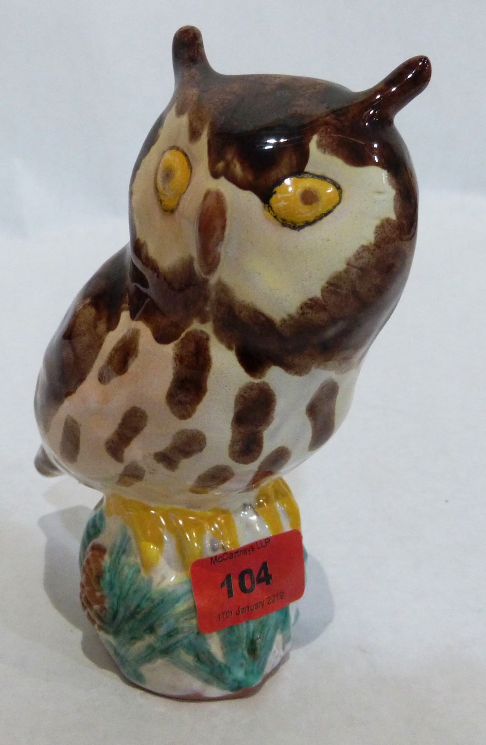 A Crannog pottery owl, glazed and painted in colours. Impressed marks. 7' high