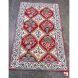 An Indian Kashmiri chainstitch rug 1.42m x 0.86m