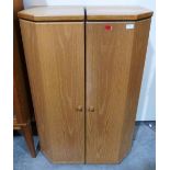 A pair of contempory style light wood cabinets. 16' wide