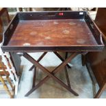 A 19th century mahogany butler's tray on folding stand. 30' wide