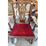 A George III mahogany 'Chippendale' elbow chair. Repairs