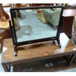 A 1960s 'Long John' coffee table and a dressing table mirror