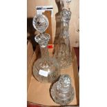 Two cut glass decanters and a cut glass scent bottle