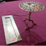 A brass letterbox aperture and surround together with a miniature brass tripod table