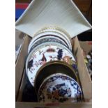 A box of miscellaneous decorated plates