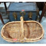 A small trunk and a wicker basket