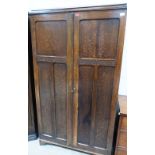 A 1930s 'An-Lyn' oak compactum style wardrobe with camphor lined fully fitted interior. 40' wide