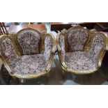 A pair of 19th century French giltwood and gesso salon chairs