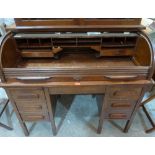 A 1930s oak roll-top desk. Tambour slick A.F. 48' wide