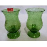 A pair of Victorian green glass storm candle holders. Possibly Bristol. 7' high. One re-stuck