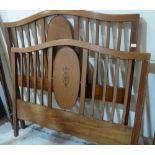 An Edward VII 4'6' mahogany and inlaid bedstead