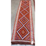 A Suzni Kilim runner 2.9m x 0.77m