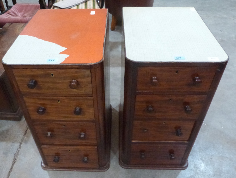 A pair of Victorian mahogany desk pedestals each with four drawers