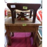 A pine boot stool with marker's plate for Salmon & Son, London; a small mahogany stool and a pair of