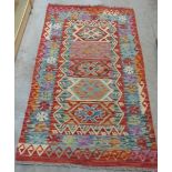 A wool Choli Kilim rug 1.55m x 0.95m