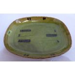 A Coldstone green glazed earthenware rectilinear dish with trailed slip decoration of wheat 13'