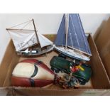 Two model yachts, balloon and racing car