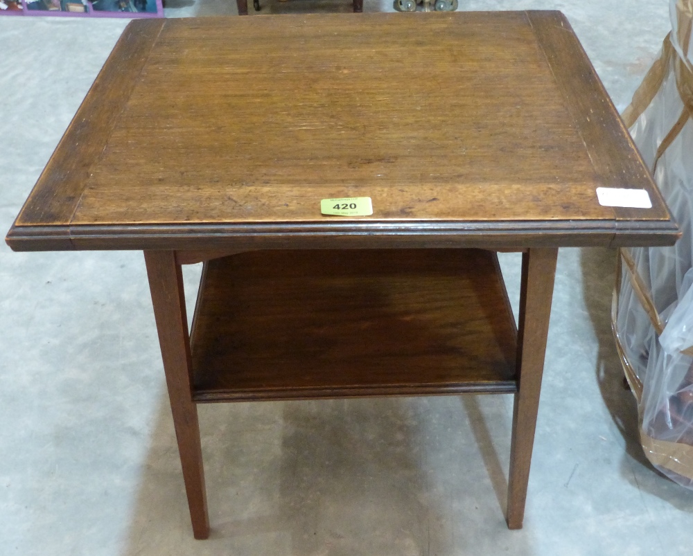 An early 20th century oak card table with baize lined fold-over top. 20' wide