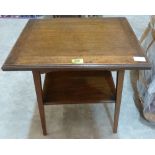 An early 20th century oak card table with baize lined fold-over top. 20' wide