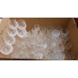 A collection of cut glass drinking glasses