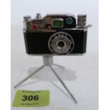 A Japanese novelty camera lighter on tripod stand. Probably 1950s