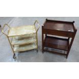 An oak two tier serving trolley with cutlery drawer and another example in gilt metal