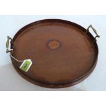 An Edward VII mahogany round tray with inlaid shell cartouche. 14½' diam