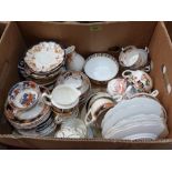 A box of miscellaneous teaware