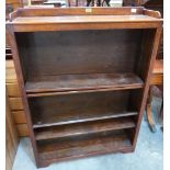 An oak open bookcase of four shelves 36' wide