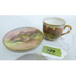 A Royal Doulton miniature cabinet cup and saucer , finely painted with a view of Ludlow Castle and