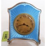 A George V silver and blue guilloche enamel dressing table clock. London 1927. 4¼' high. Movement