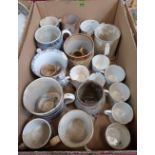 A collection of pottery mugs. Prov: Estate of Islwyn Watkins