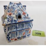 An 18th century delftware polychrome cottage. 3½' high. Prov: Estate of Islwyn Watkins