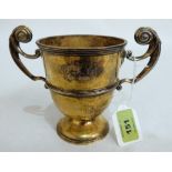 An Edward VII silver gilt two handled cup by J. Parkes. London 1903. 5¼' high. 12ozs