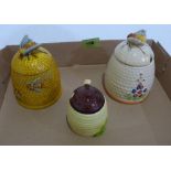 Three bee skep honeypots with covers, 1940s-50s