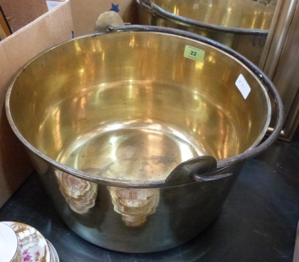 A brass preserving pan with iron handle. 15' diam