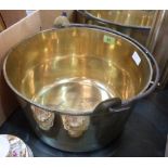A brass preserving pan with iron handle. 15' diam