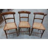 A set of three faux rosewood chairs with cane seats. 19th century