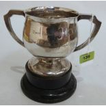 A George V silver two handled trophy cup. Engraved. Chester 1935. 4¾' high. 12ozs