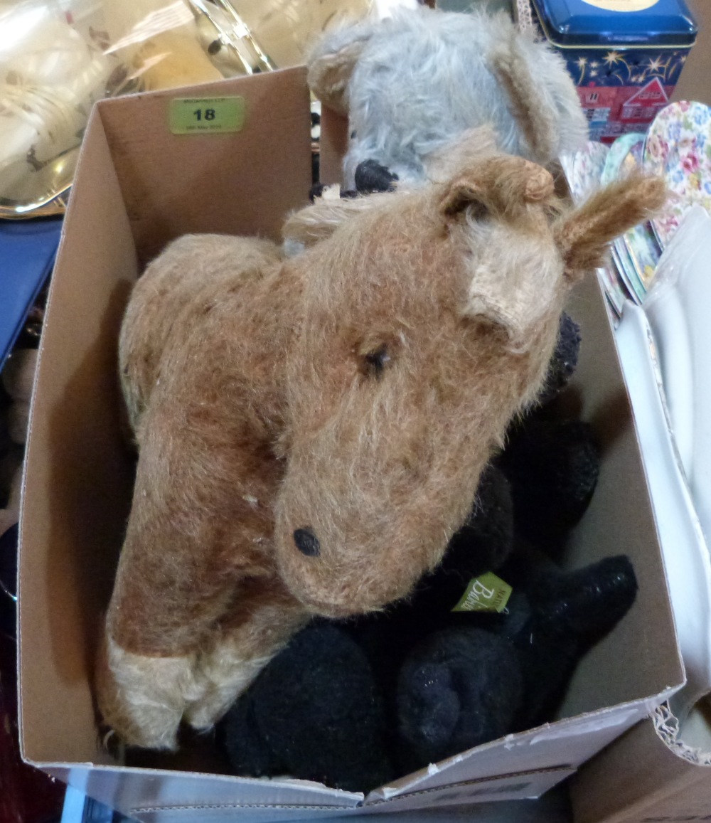 A gold plush horse and other vintage soft toys