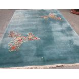 A Chinese blue ground carpet. 12'7' x 9'